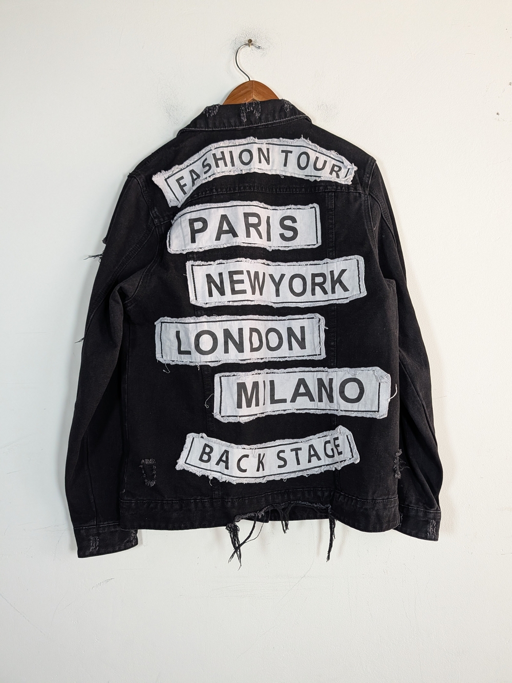 Fashion Nova Black Distressed Denim Jacket with City Patch Design, Size M